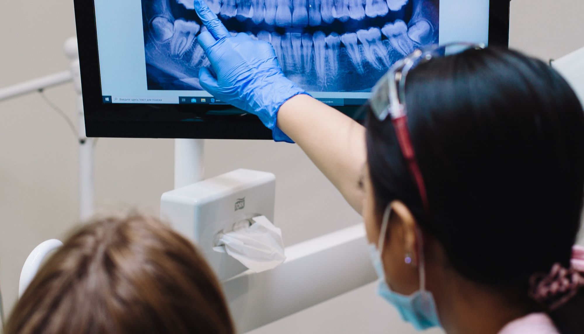 Dentist's Showing Patients Teeth